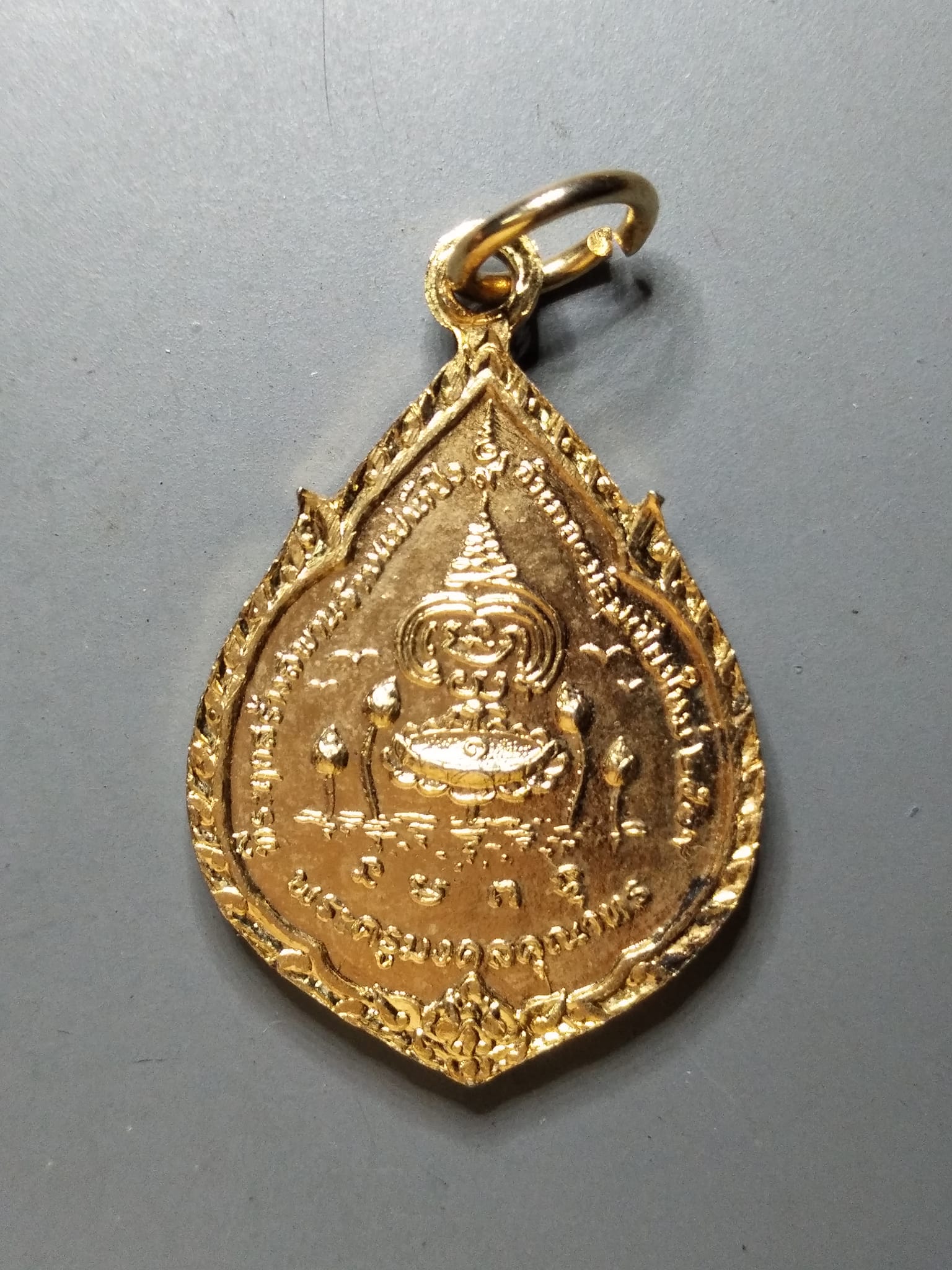 G083 เหรียญกะหลั่ยทอง พระเจ้าทันใจ หลวงพ่อพระครูมงคลคุณาทร วัดหม้อคำตวง จ.เชียงใหม่ ปี2519