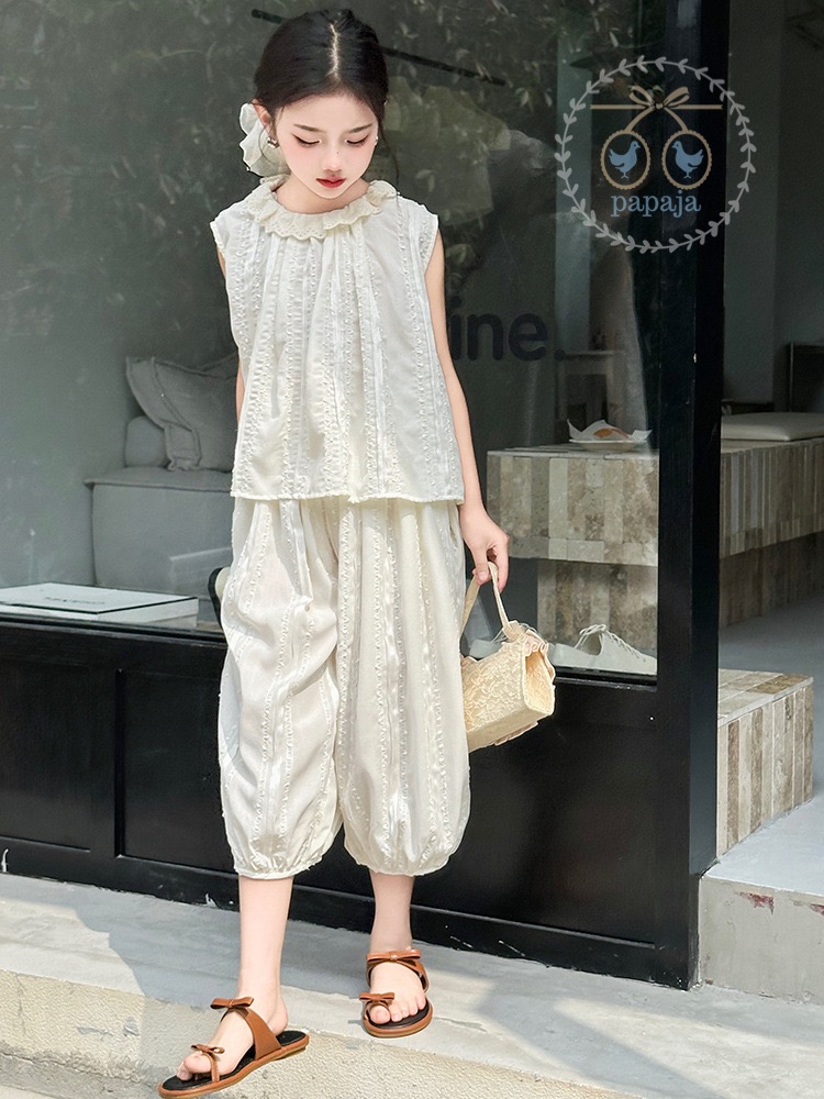 เซตเสื้อแขนกุดสีขาวครีมพร้อมกางเกงทรงฮาเล็ม