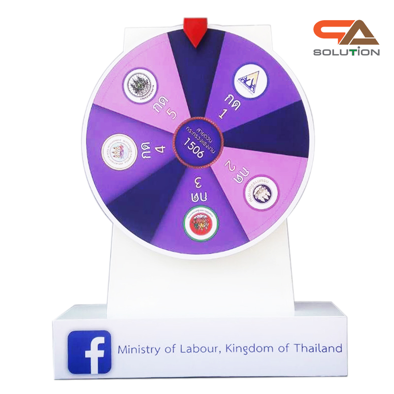 เกมส์วงล้อตั้งโต๊ะ รุ่นเหล็ก ขนาดวงล้อ 40 ซม. สูง 60 cm. สีขาว พร้อมงานพิมพ์สติ๊กเกอร์ ออกแบบได้ตามความต้องการ