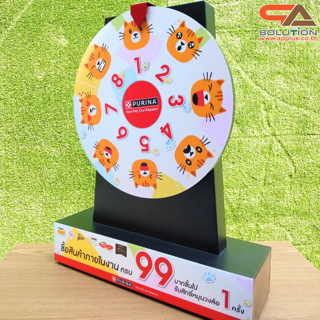 เกมส์วงล้อตั้งโต๊ะ รุ่นเหล็ก ขนาดวงล้อ 40 ซม. สูง 60 cm. สีขาว พร้อมงานพิมพ์สติ๊กเกอร์ ออกแบบได้ตามความต้องการ