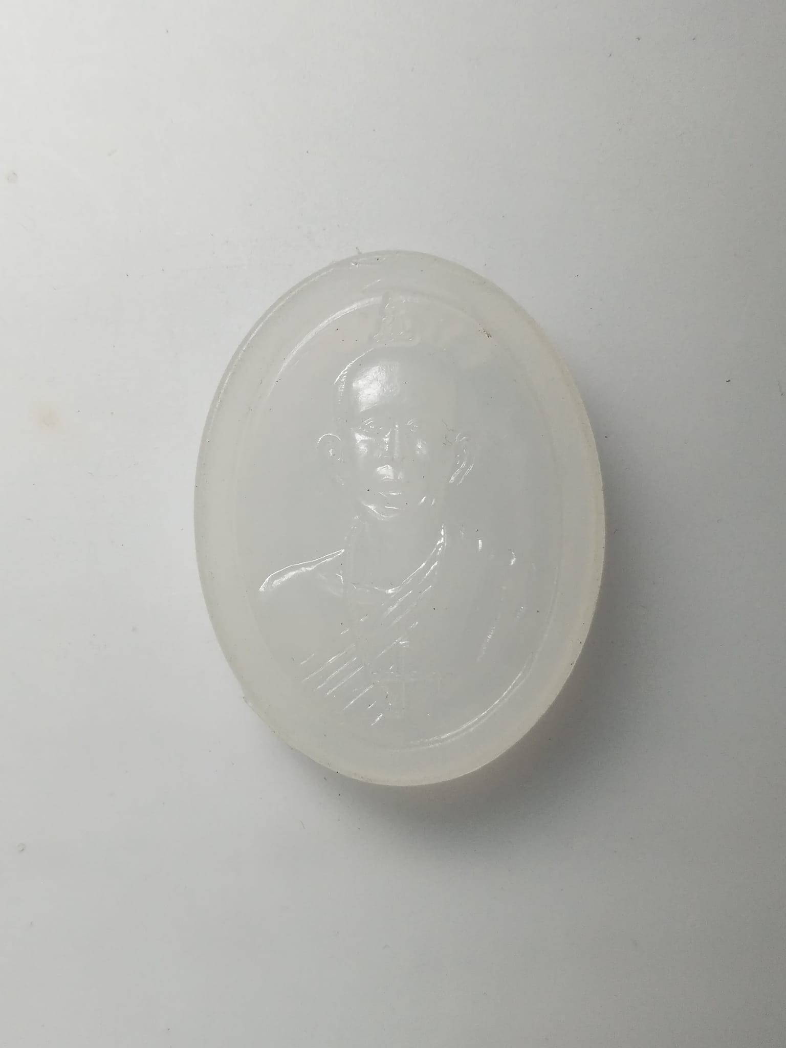 G693 เหรียญพลาสติกหลวงพ่อโอภาสี หลังครุฑแบกเสมา