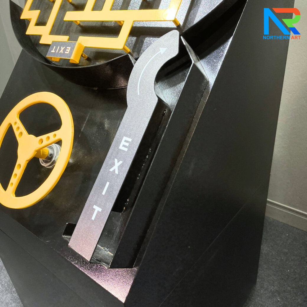 เกมส์เขาวงกต รุ่นพวงมาลัยรถ ขนาด (W)70 x (D)60 x (H)145 cm. โครงเหล็กพ่นสีอุตสาหกรรมพร้อมล้อเลื่อน ลูกแก้วคละสี 5 ลูก