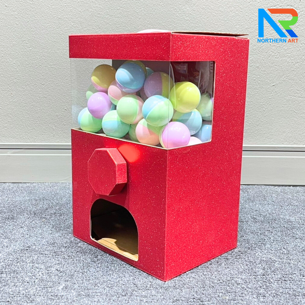 เกมส์หมุนบอล จับรางวัล ตั้งโต๊ะ กล่องสีแดง ขนาด 23 x 18 x 35 cm. พร้อมลูกบอลใส่ฉลาดขนาด 45 มม. จำนวน 40 ลูก