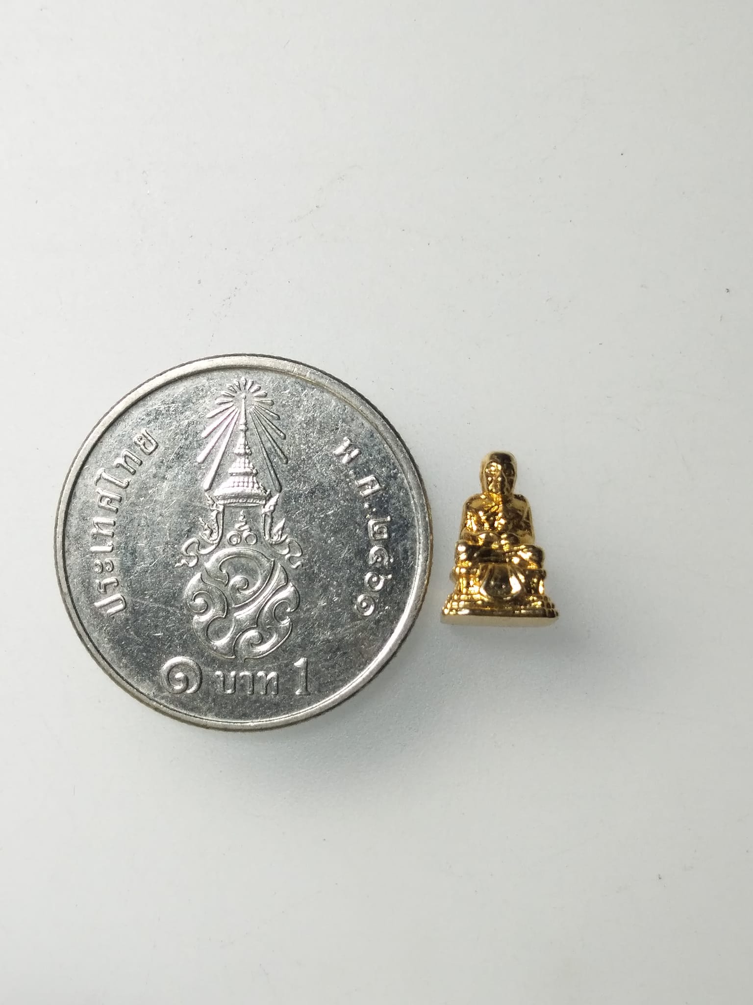 H082 รูปหล่อหลวงปู่ทวดจิ๋ว รุ่นร่ำรวยเงินทอง วัดช้างให้ ปัตตานี ปี2541