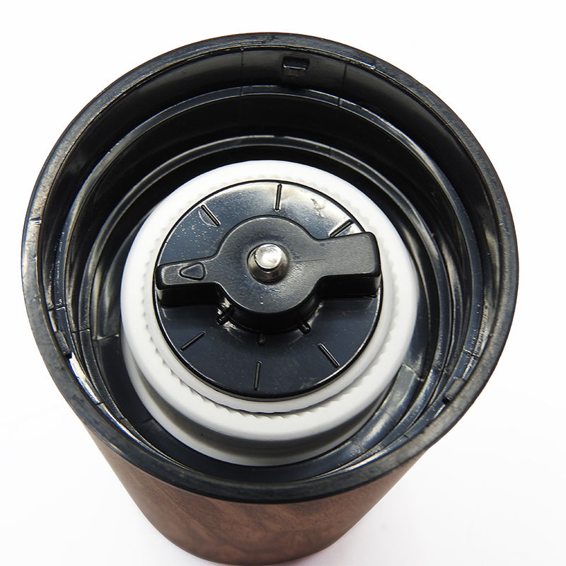Manual coffee grinder, wooden cylinder