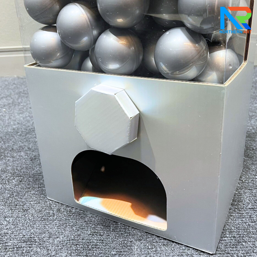 เกมส์หมุนบอล จับรางวัล ตั้งโต๊ะ กล่องสีเทา ขนาด 24.5 x 19.5 x 36.5 cm. พร้อมลูกบอลใส่ฉลาดขนาด 55 มม.จำนวน 30 ลูก