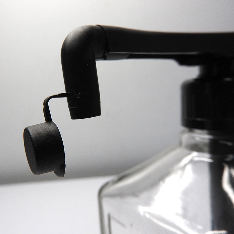 Syrup bottle with black pump