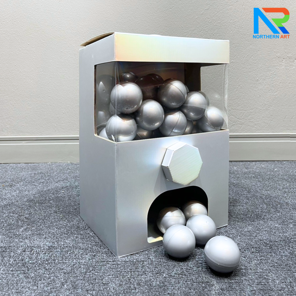 เกมส์หมุนบอล จับรางวัล ตั้งโต๊ะ กล่องสีเทา ขนาด 24.5 x 19.5 x 36.5 cm. พร้อมลูกบอลใส่ฉลาดขนาด 55 มม.จำนวน 30 ลูก