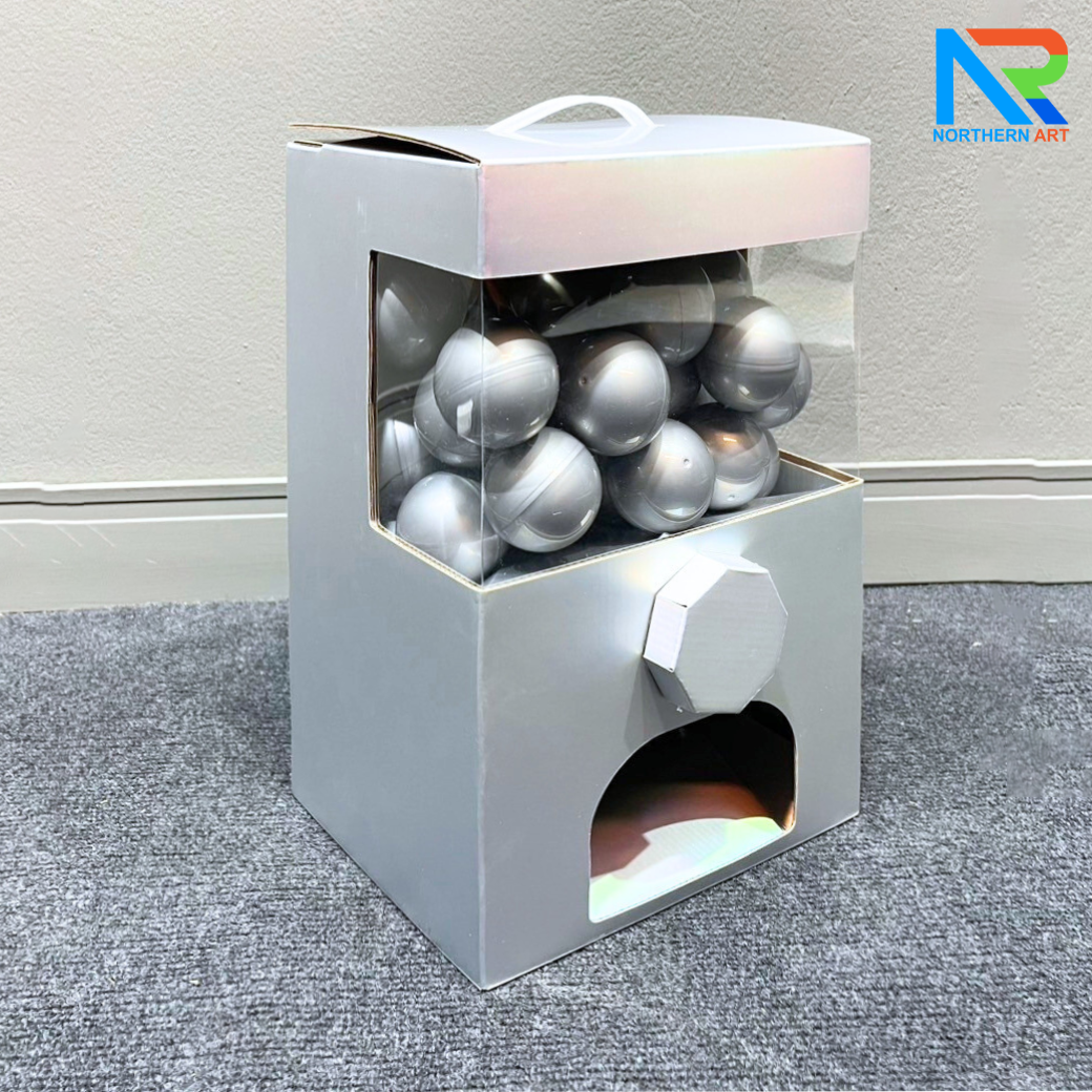 เกมส์หมุนบอล จับรางวัล ตั้งโต๊ะ กล่องสีเทา ขนาด 24.5 x 19.5 x 36.5 cm. พร้อมลูกบอลใส่ฉลาดขนาด 55 มม.จำนวน 30 ลูก