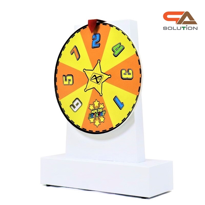 เกมส์วงล้อตั้งโต๊ะ รุ่นเหล็ก ขนาดวงล้อ 40 ซม. สูง 60 cm. สีขาว พร้อมงานพิมพ์สติ๊กเกอร์ ออกแบบได้ตามความต้องการ