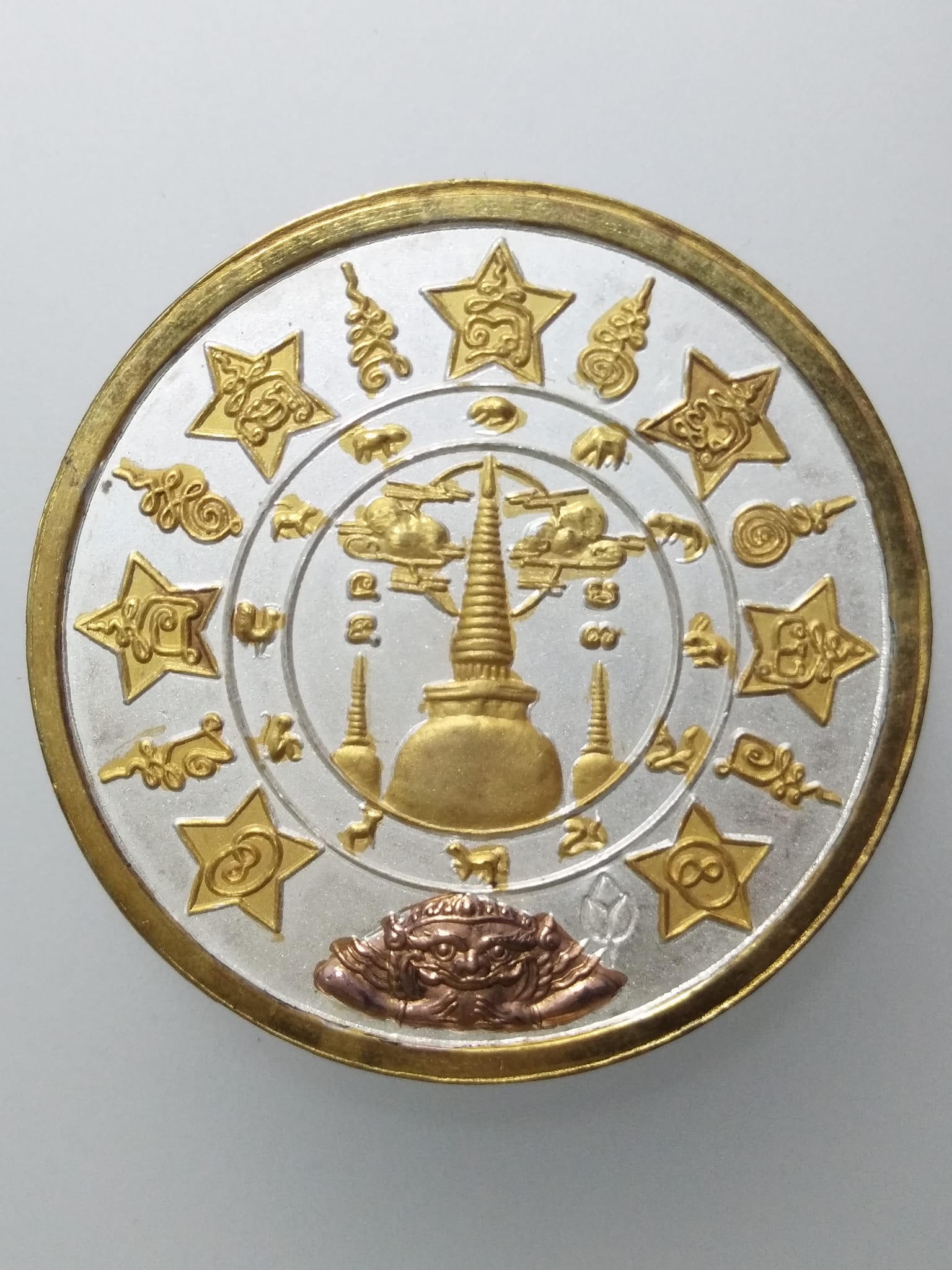 E119 เหรียญจตุคามรามเทพ หลังตอกโค๊ตดอกบัว