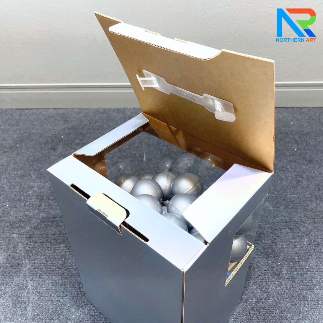 เกมส์หมุนบอล จับรางวัล ตั้งโต๊ะ กล่องสีเทา ขนาด 24.5 x 19.5 x 36.5 cm. พร้อมลูกบอลใส่ฉลาดขนาด 55 มม.จำนวน 30 ลูก